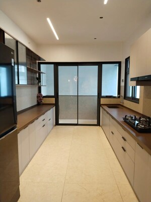 Kitchen in 3 BHK Apartment at Unique Envogue, Mundhwa – for Sale