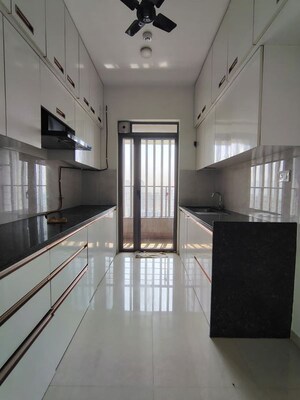 Kitchen in 2 BHK Apartment at Kalpataru Paramount, Kapur Bawdi – for Sale