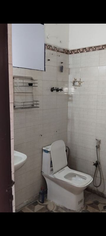 Bathroom in 3 BHK Builder Floor at Bharti Apartments, Shakti Khand iv – for Rent