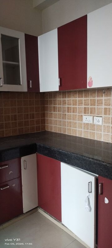 Kitchen in 2.5 BHK Apartment at Mahagun Mywoods, Sector 16c Greater Noida – for Sale