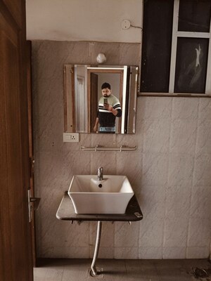 Bathroom in 3 BHK Apartment at Dhakoli – for Sale