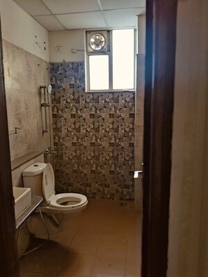 Bathroom in 3 BHK Apartment at Dhakoli – for Sale