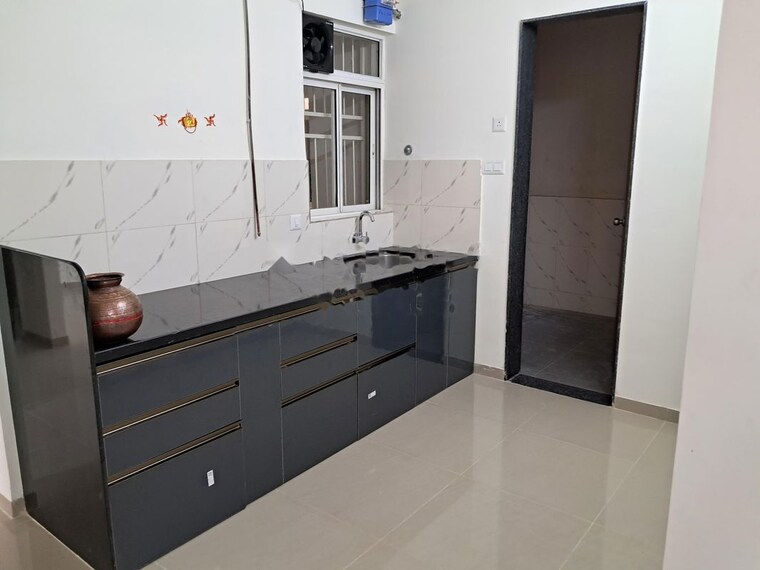 Kitchen, kolte-patil-life-republic-16th-avenue-arezo 2 Bedroom 910 Sq.Ft. Apartment In Hinjewadi Pune 10032911