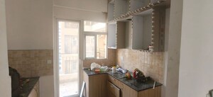 Kitchen in 4 BHK Apartment at Amrapali Crystal Homes, Sector 76 – for Rent