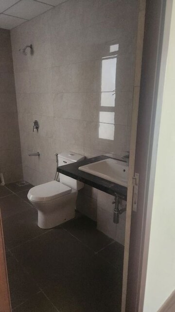 Bathroom in 4 BHK Apartment at Kalpataru Vista, Sector 128 – for Rent