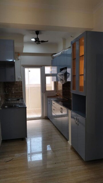 Kitchen in 3 BHK Apartment at Amrapali Golf Homes, Sector 4 Greater Noida – for Sale