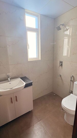 Bathroom in 2.5 BHK Builder Floor at M3M Soulitude, Sector 89 – for Sale