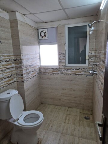 Bathroom in 3 BHK Apartment at Amrapali Golf Homes, Sector 4 Greater Noida – for Rent