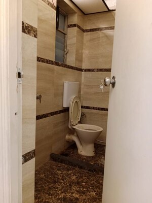 Bathroom in 3 BHK Apartment at Siddhachal Shopping Centre, Vasant Vihar – for Rent