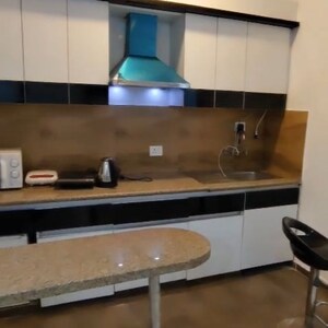 Kitchen in 1 BHK Apartment at Nimbus The Golden Palm, Sector 168 – for Rent