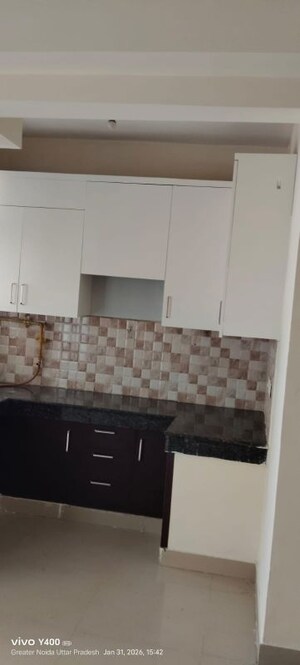 Kitchen in 2 BHK Apartment at Amrapali Golf Homes, Sector 4 Greater Noida – for Sale