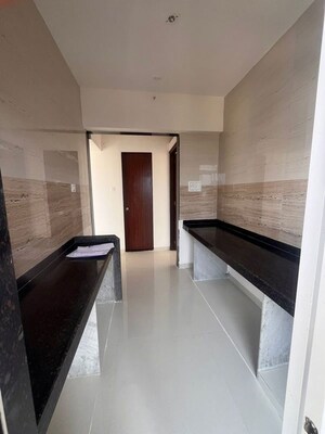 Kitchen in 1 BHK Apartment at Metropolis Bayside, Kasarvadavali – for Rent