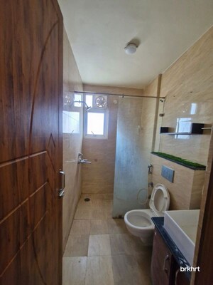 Bathroom in 3 BHK Apartment at Capital Heights Niranjanpur, Gms Road – for Rent