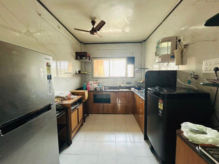 Kitchen, sun city 1.5 Bedroom 910 Sq.Ft. Apartment In Sun City Pune 10033518