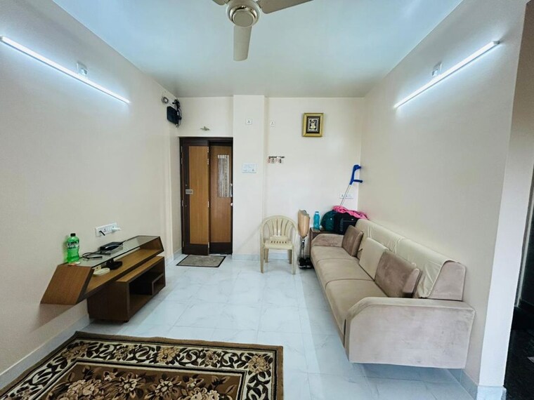 Living Room, sun city 1.5 Bedroom 910 Sq.Ft. Apartment In Sun City Pune 10033518