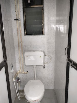 Bathroom in 1 BHK Apartment at Marwadi Wadi Tower, Parel – for Rent