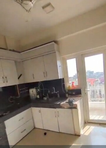 Kitchen in 4 BHK Apartment at VVIP Addresses, Raj Nagar Extension – for Sale