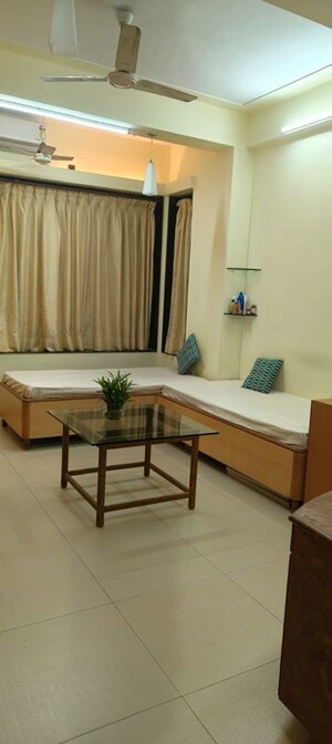 Living Room in 1 BHK Apartment at Gulmohar CHS, Mahim – for Rent