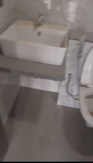 Bathroom in 1 BHK Apartment at Paradigm El Signora, Jogeshwari West – for Sale