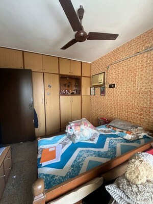 Bedroom in 2 BHK Apartment at Debonair Apartments, Mahim West – for Rent