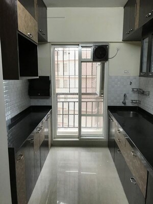 Kitchen in 1 BHK Apartment at Rosa Gardenia, Anand Nagar – for Sale