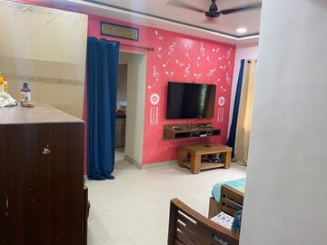 Living Room in 1 BHK Apartment at Satellite Garden, Goregaon East – for Sale