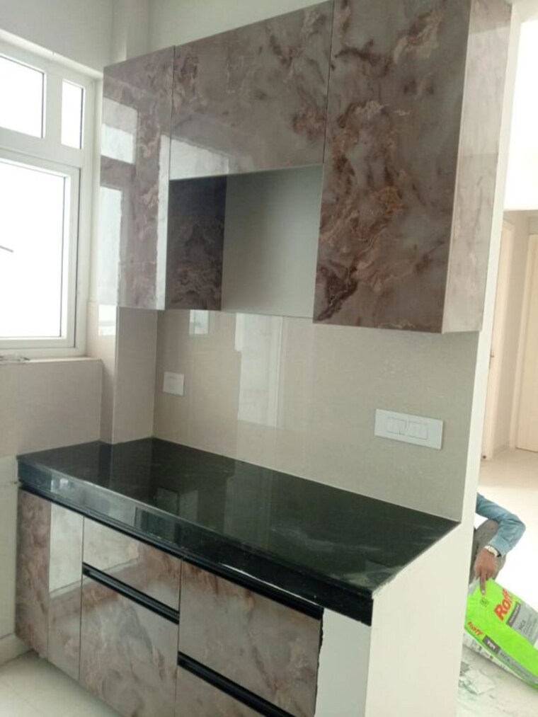 Kitchen, eldeco-live-by-the-greens 2 Bedroom 668 Sq.Ft. Apartment In Sector 150 Noida 10034183