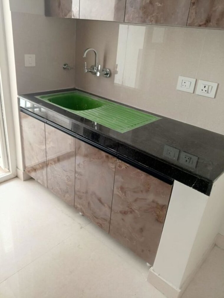 Kitchen, eldeco-live-by-the-greens 2 Bedroom 668 Sq.Ft. Apartment In Sector 150 Noida 10034183