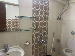 Bathroom in 3 BHK Apartment at Lashkaria Green Towers, Andheri West – for Rent