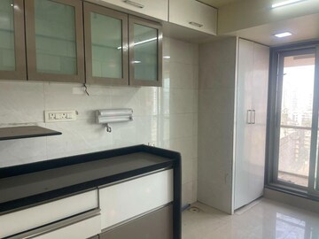 Kitchen in 3 BHK Apartment at Lashkaria Green Towers, Andheri West – for Rent