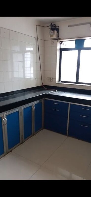 Kitchen in 3 BHK Apartment at Krishna Residency Malad West, Malad West – for Rent
