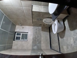 Bathroom in 2 BHK Apartment at Ganga Arcadia, Kharadi – for Rent