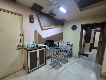 Living Room in 1 BHK Apartment at Riddhi Gardens CHS, Malad East – for Rent