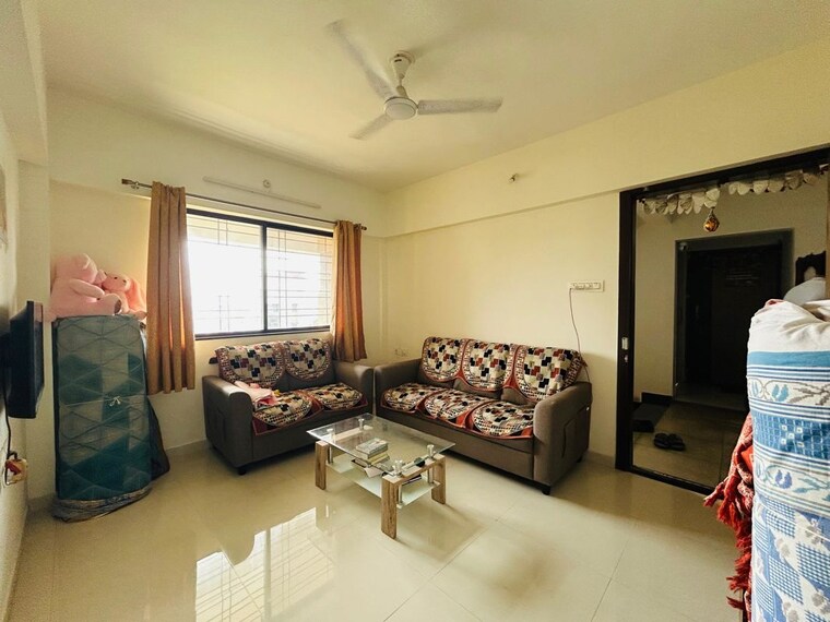 Living Room, sun-paradise-apartment 2 Bedroom 800 Sq.Ft. Apartment In Anand Nagar Pune 10034575