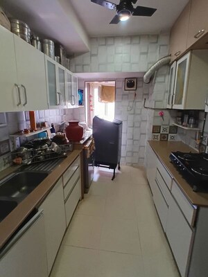 Kitchen in 3 BHK Apartment at Lokhandwala Whispering Palms, Kandivali East – for Rent