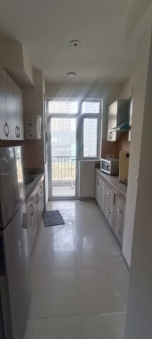 Kitchen in 3.5 BHK Apartment at Emaar Emerald Estate, Sector 65 – for Rent