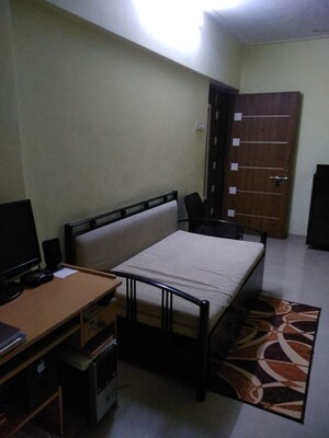 Living Room in 1 BHK Apartment at Lokhandwala Whispering Palms, Kandivali East – for Rent