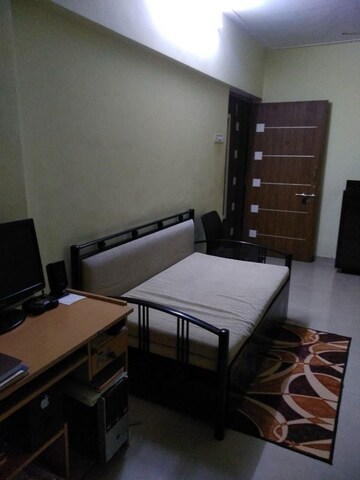 Living Room in 1 BHK Apartment at Lokhandwala Whispering Palms, Kandivali East – for Rent