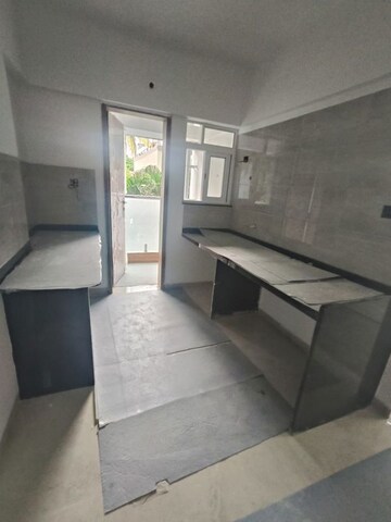 Kitchen in 2 BHK Apartment at Kakkad Kailash Kutir, Wanwadi – for Sale