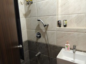 Bathroom in 1 BHK Apartment at Sethia Kalpavruksh Heights, Kandivali West – for Rent