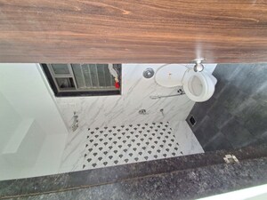 Bathroom in 1 BHK Apartment at UK Iridium, Kandivali East – for Rent