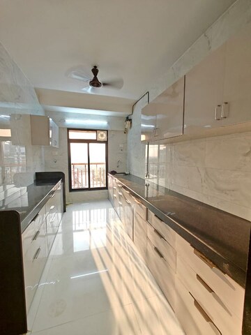 Kitchen in 3 BHK Apartment at Pranav Sparsh CHS, Malad West – for Rent