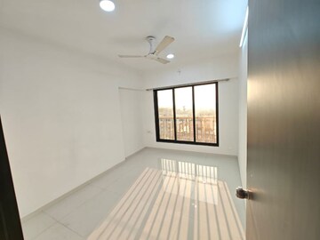 Bedroom in 3 BHK Apartment at Pranav Sparsh CHS, Malad West – for Rent