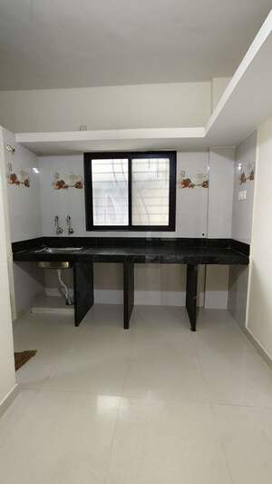 Kitchen in 1 BHK Apartment at Wadgaon Sheri – for Rent