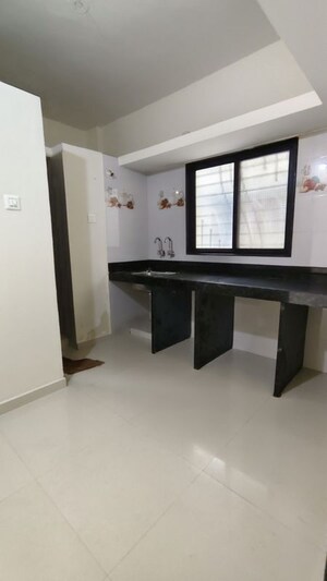 Kitchen in 1 BHK Apartment at Wadgaon Sheri – for Rent