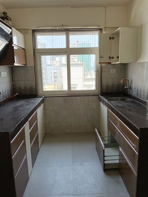 Kitchen in 2 BHK Apartment at Woodstock Apartment Khar, Khar West – for Sale