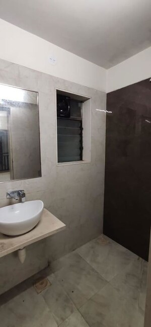 Bathroom in 2 BHK Apartment at Kesar Scion, Ghatkopar East – for Rent