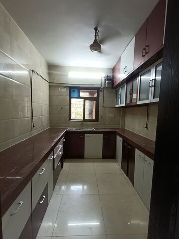 Kitchen in 2 BHK Apartment at Jasmine Tower, Vasant Vihar – for Rent