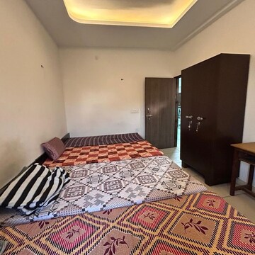 Bedroom in  Pg at Garhi Village – for Rent
