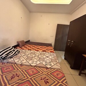 Bedroom in  Pg at Garhi Village – for Rent